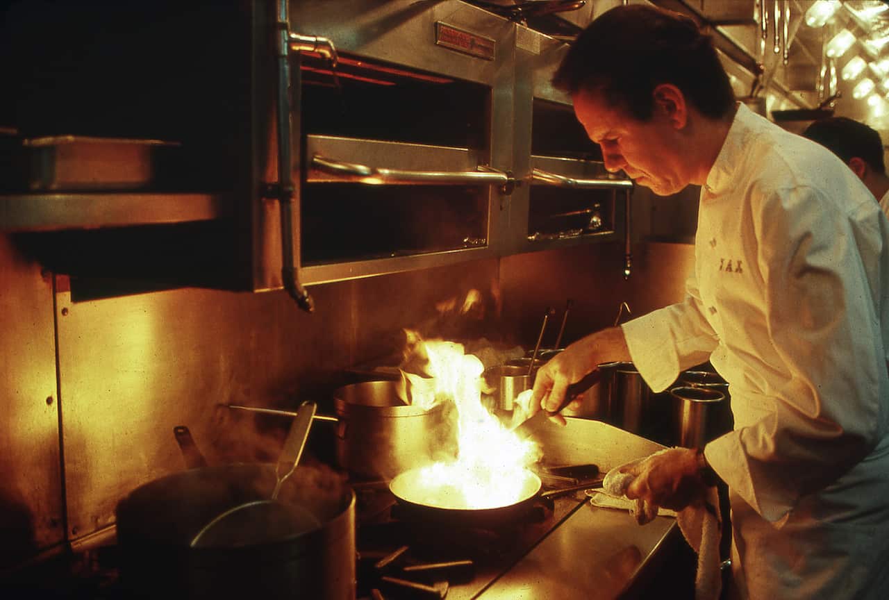 Gourmet Chef Thomas Keller Cooks in Kitchen of Restaurant in Los Angeles