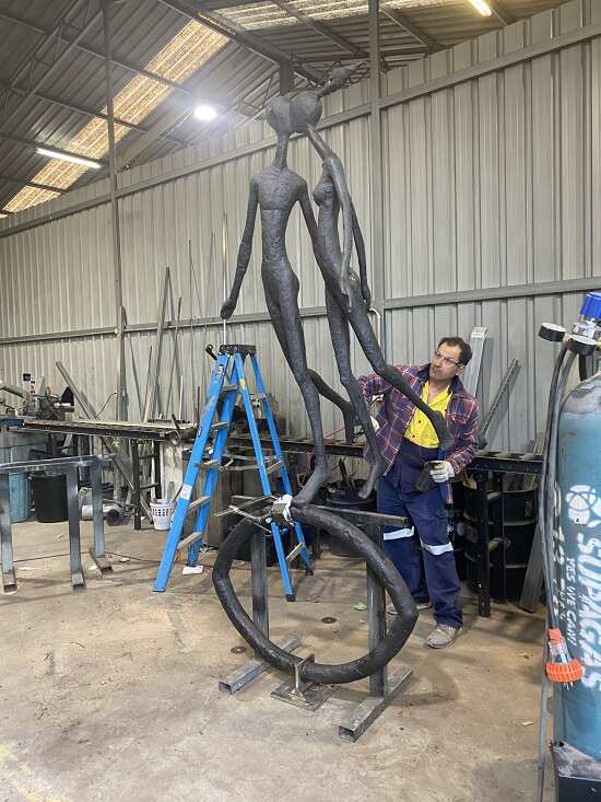 Ayad Alqaragholli on work.png