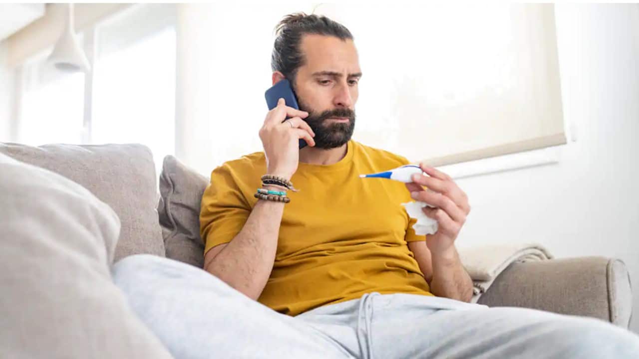 man with fever sick at home passing quarantine .jpg