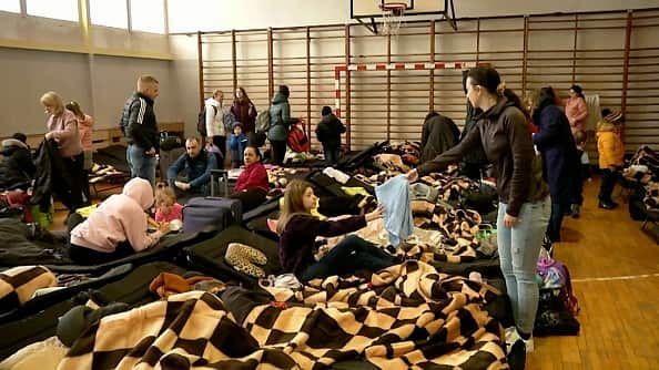 Refugees from Ukraine in a gymnasium in Poland.