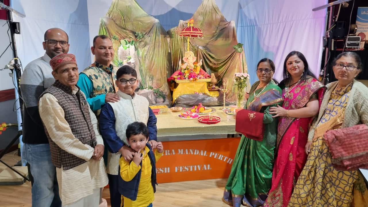 Atharva (in blue kurta) with his family.