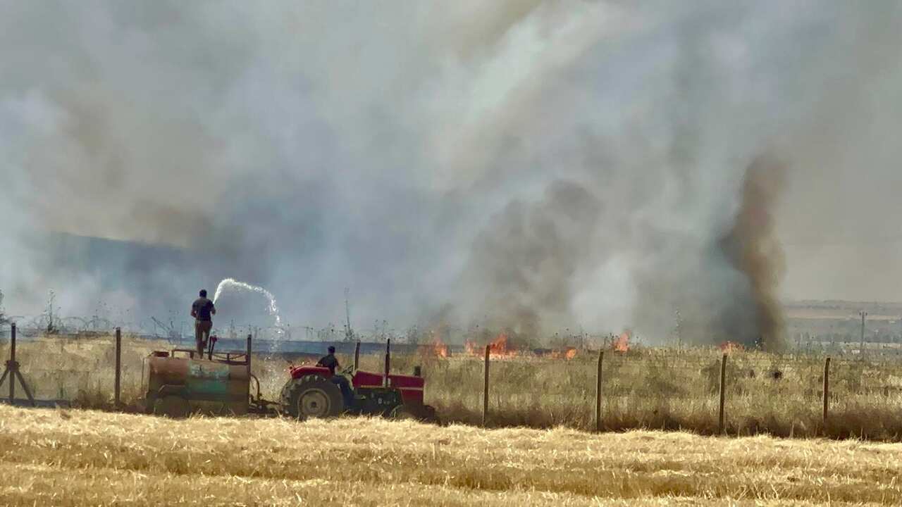 Villiagers trying to put out fire.jpeg