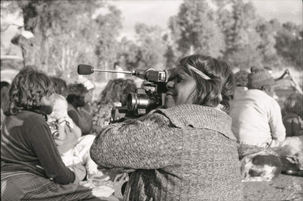 Pantjiti Unkari McKenzie filming inma for EVTV at Win HilliardÕs farewell. Guthrie &amp;amp; Irving Collection, Ara Irititja 36042