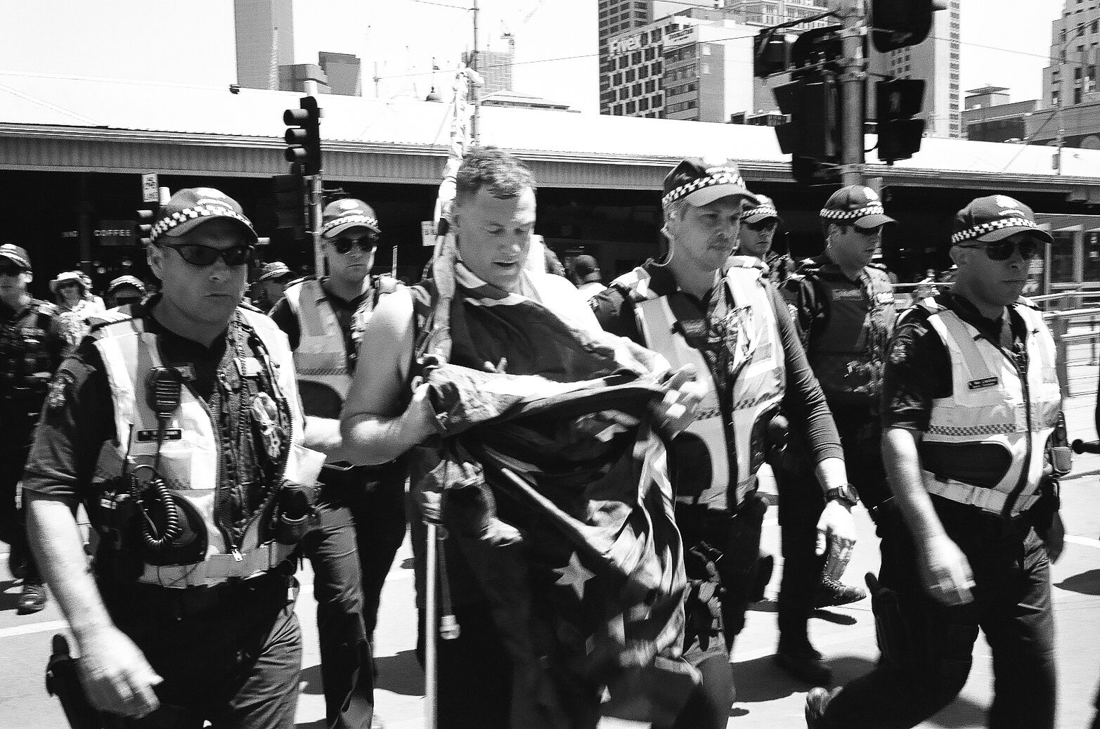 With far right threats to disrupt the march on social media the preceding week, police were quick to quell the disruption and escort the man away. 