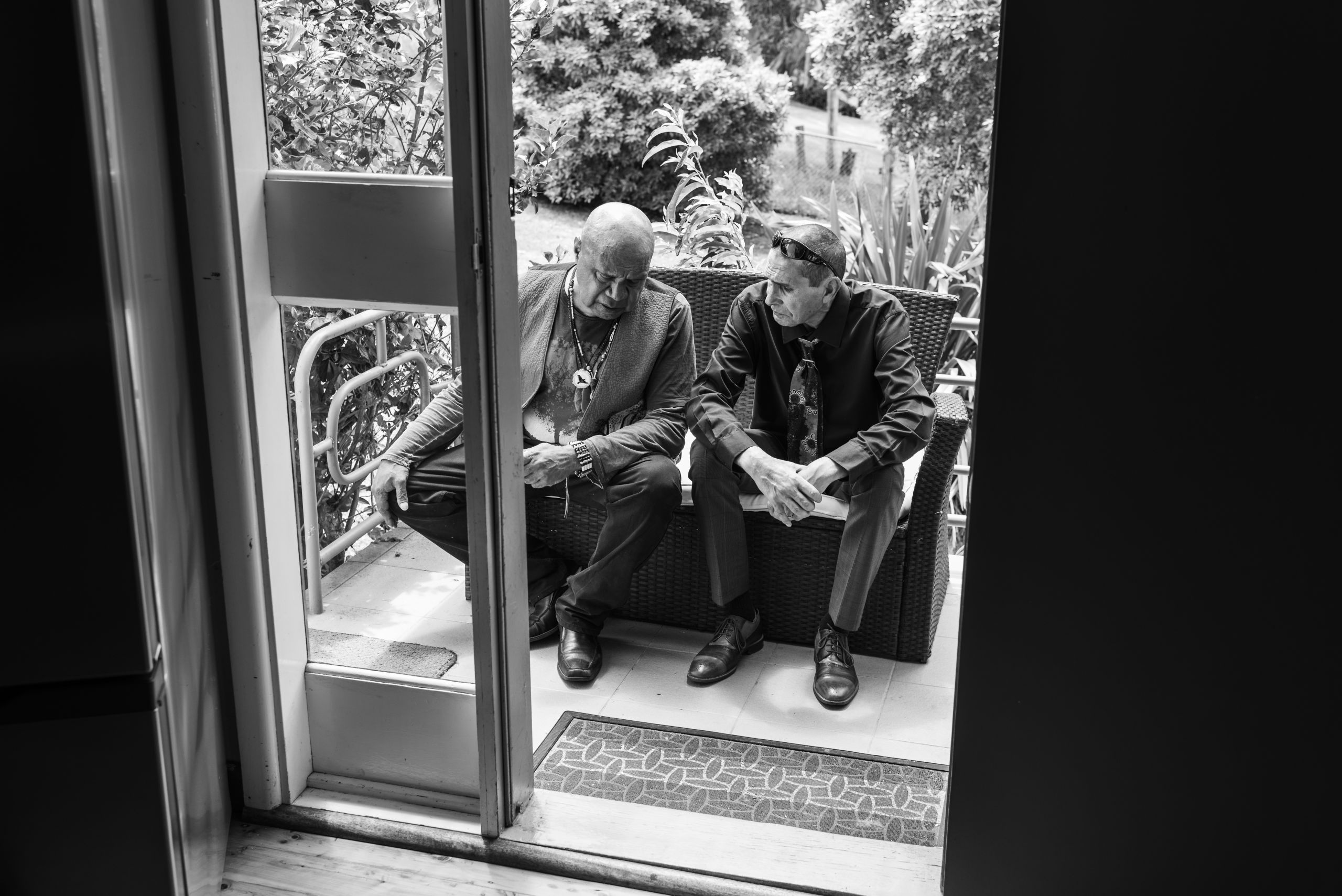 Gunditjmara Singer/Songwriter Archie Roach and Glen talk before the living wake. They have known each other since Glen was a teenager. 20 January 2019. Yuin Country (Central Tilba, NSW).