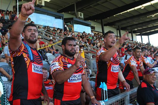 Griffith Three Ways players, including David and Andrew Fifita, cheering on their team at the annual Koori Knockout in Dubbo 2015. The image was used for an article by Sydney masthead The Daily Telegraph