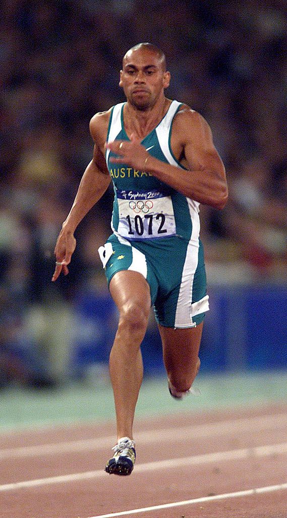 Patrick Johnson of Australia in the second round of the mens 100m during the Sydney 2000 Olympic Games at Olympic Stadium, Sydney Olympic Park, Sydney, Australia. Credit: Adam Pretty/ALLSPORT