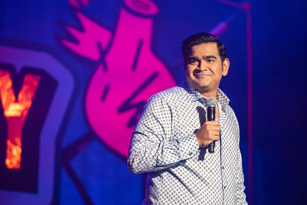 Comedian Dilruk Jayasinha on stage at the RAW Comedy Festival 2023.jpg