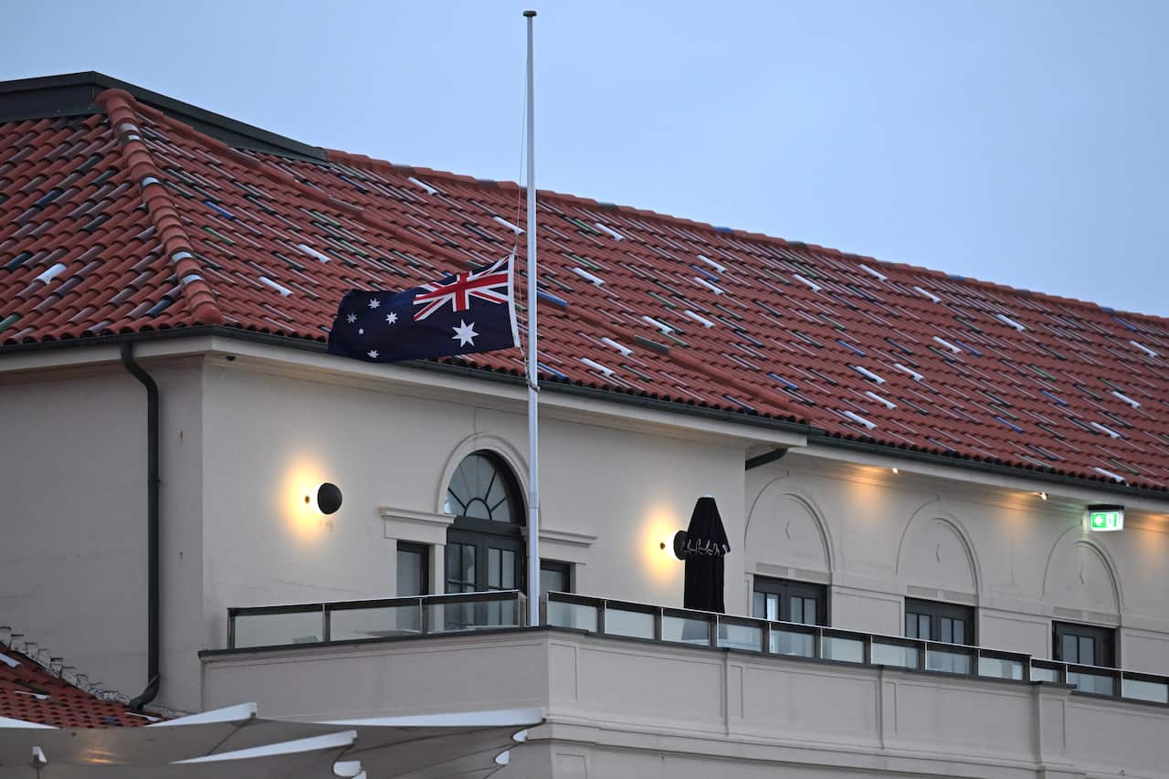 A flag being flown at half mast.