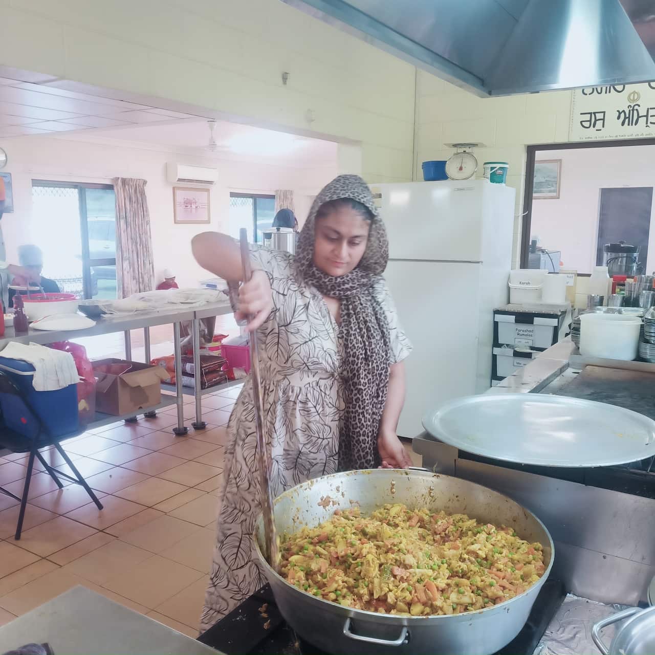 Image of Gurpreet Kaur cooking, credit to Gurpreet Kaur.jpeg