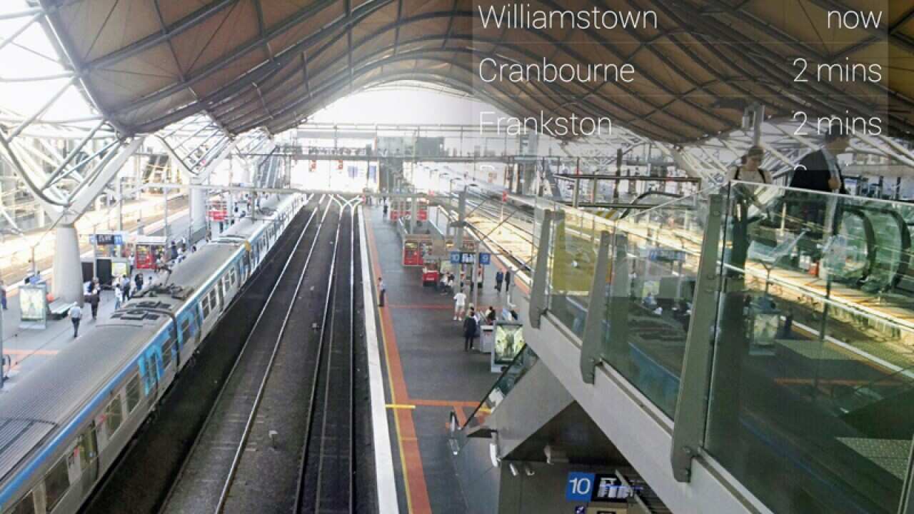 A mockup of a Google Glass public transport timetable app