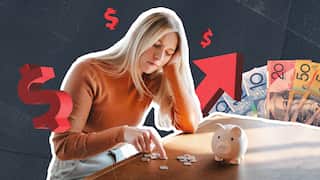 A woman counting coins