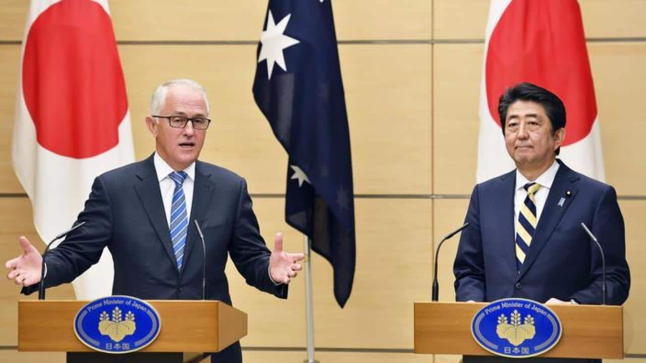 Japanese Prime Minister Shinzo Abe (R) and his Australian counterpart Malcolm Turnbull hold a joint press conference at the prime minister's office in Tokyo on Jan. 18, 2018. (Kyodo)==Kyodo