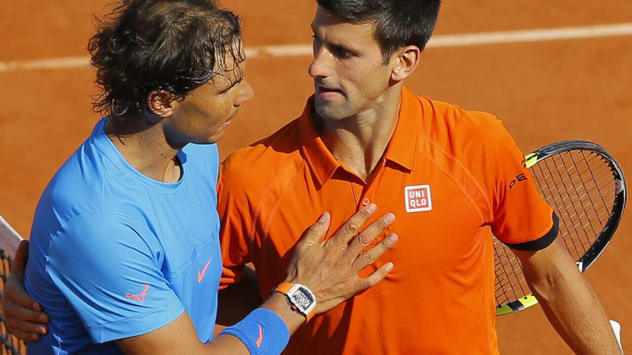 Novak Djokovic of Serbia (R) and Rafael Nadal of Spain