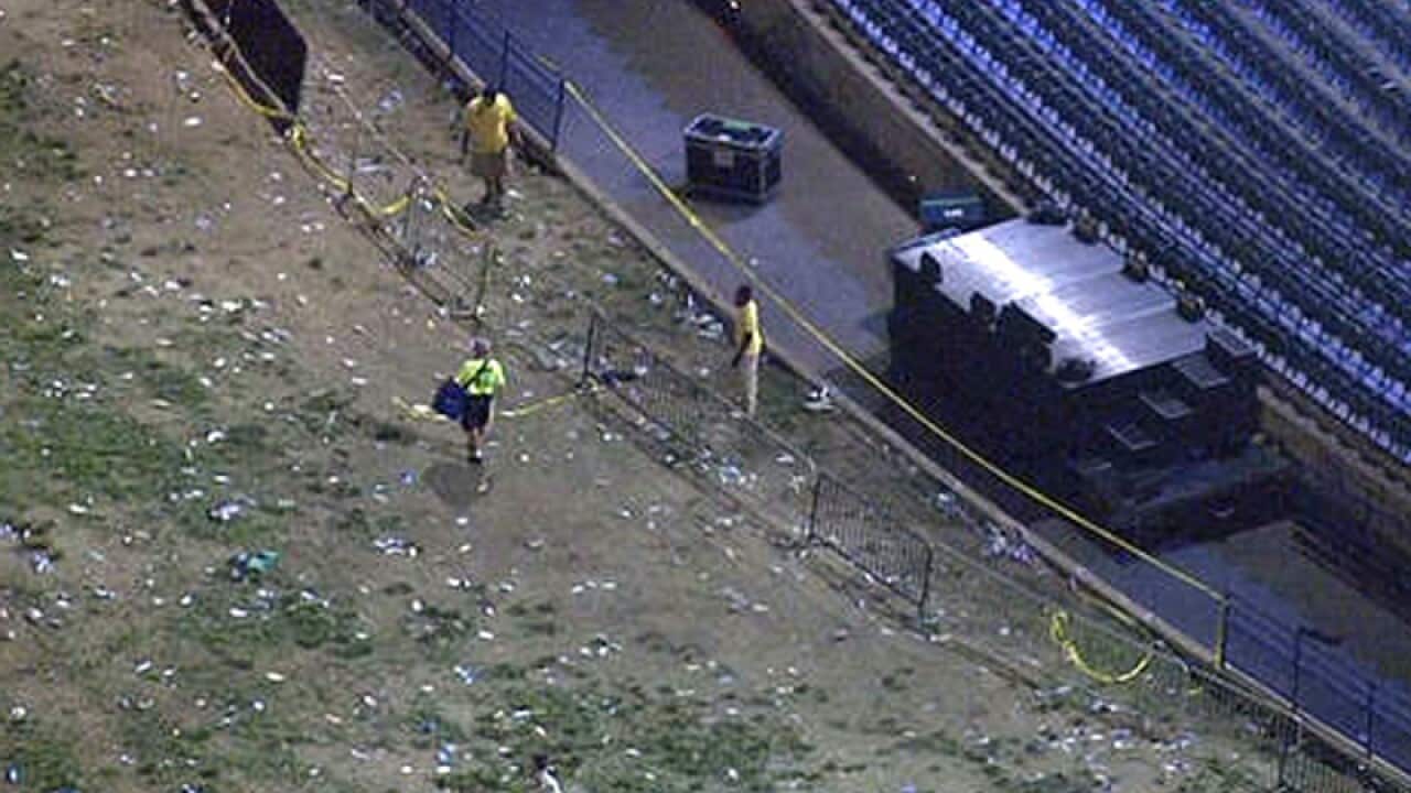 Tape placed across a gap in railing after a concert by Snoop Dogg