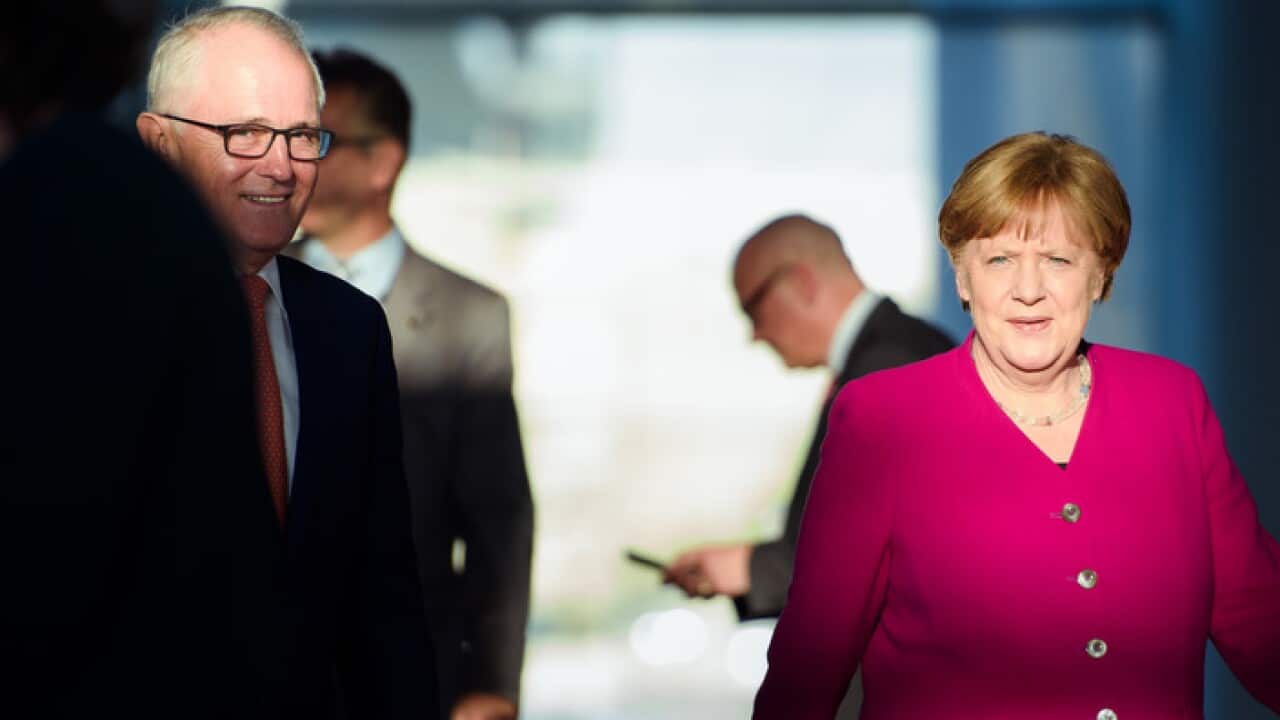 آنگلا مرکل صدر اعظم آلمان (راست) و مالکوم ترنبل نخست وزیر استرالیا (چپ)