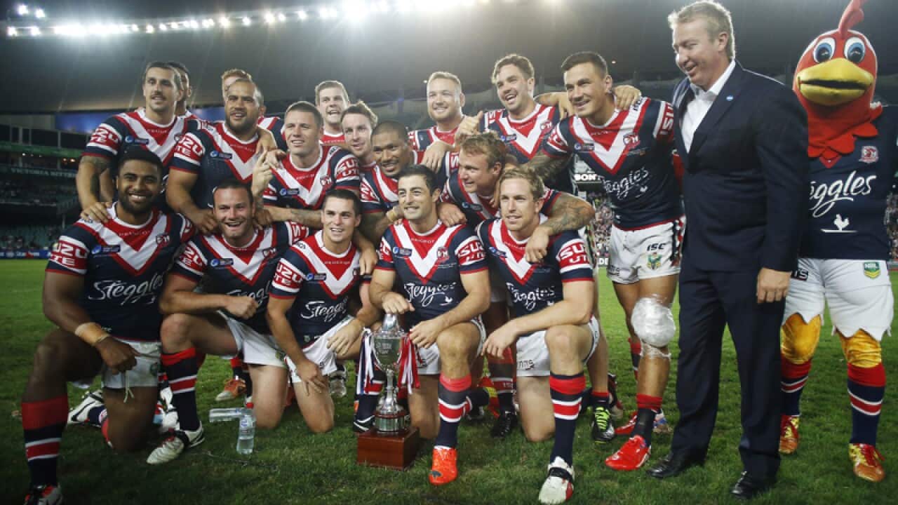 Roosters players celebrate victory over Wigan