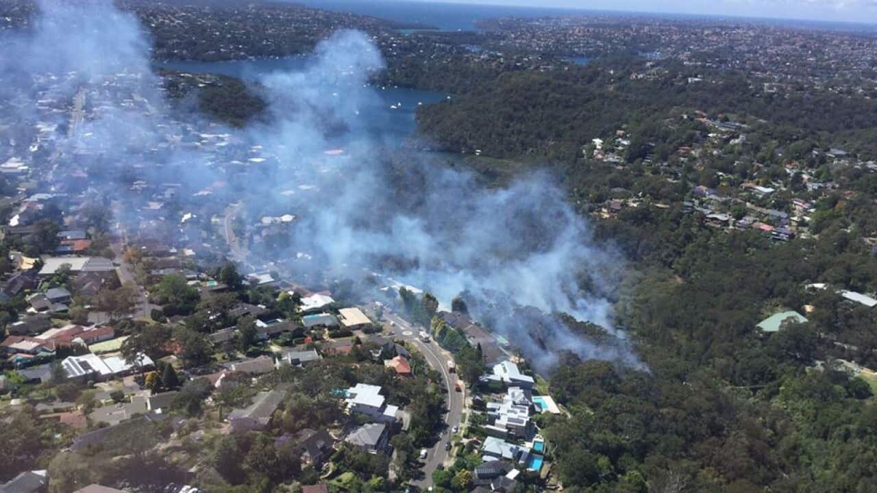 A supplied image of a fire burning out of control in Castle Cove, Sydney, Saturday, Nov. 5, 2016. (AAP Image/NSW Rural Fire Service) NO ARCHIVING, EDITORIAL USE ONLY