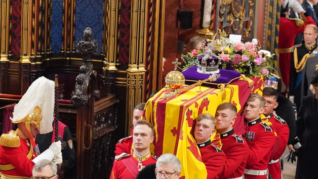 The Queen's coffin is carried into her state funeral (AAP).jpg