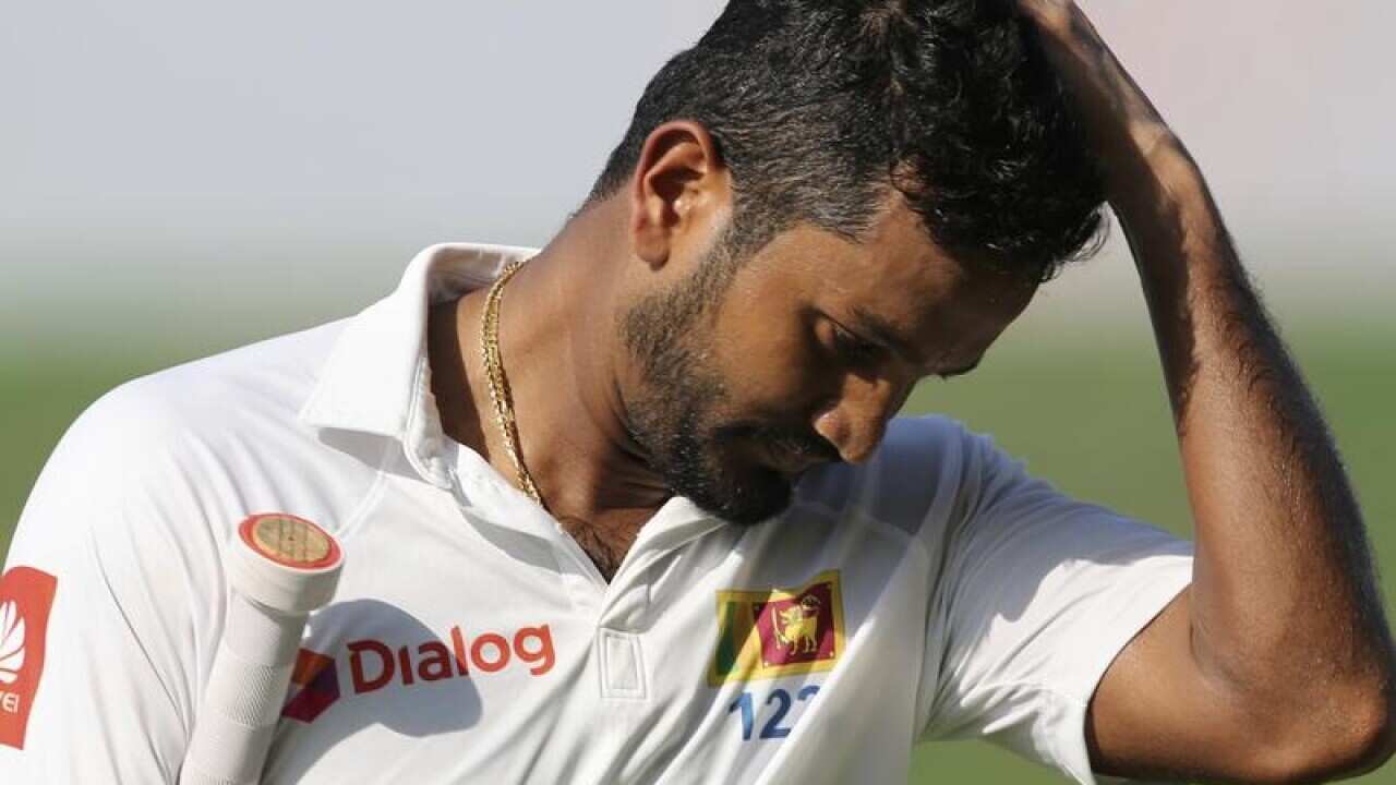 Dimuth Karunaratne.
