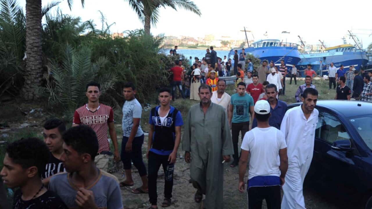 Relatives of missing persons on a capsized boat in Rosetta, Egypt