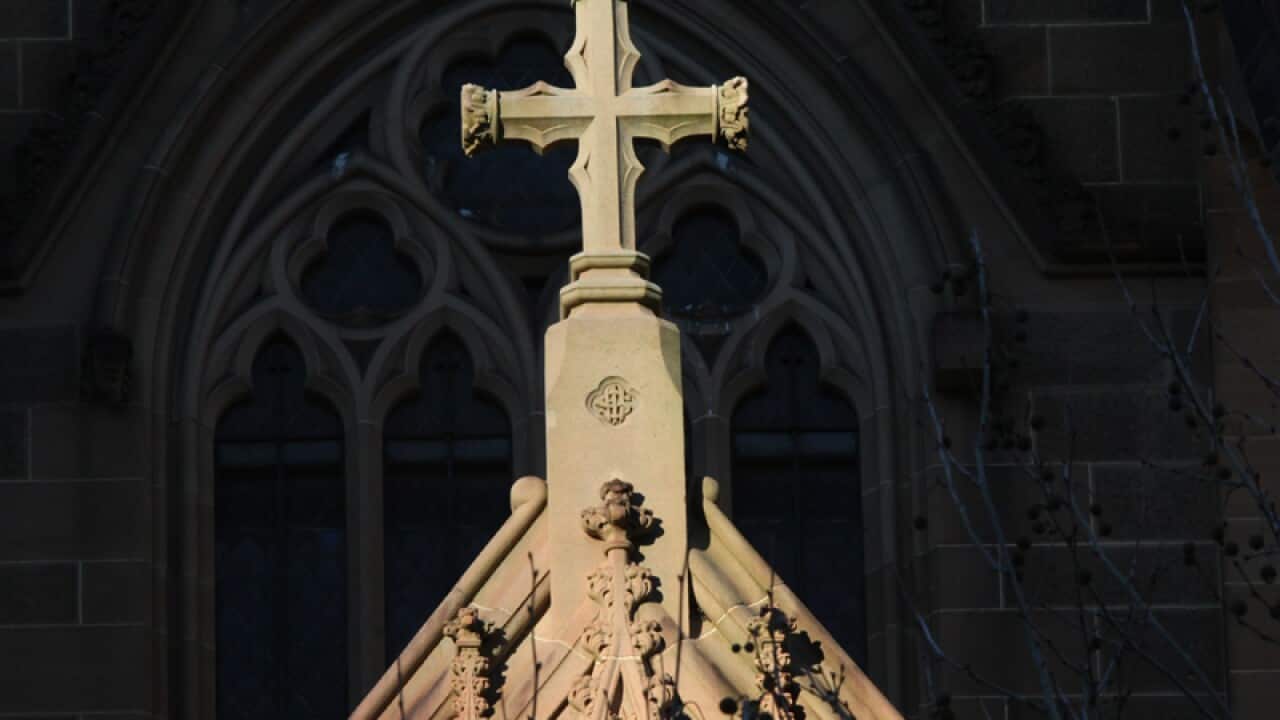 A cross on the exterior of St Mary's Cathedral