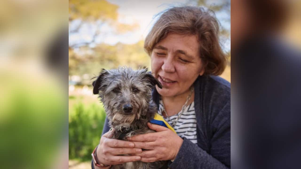 Meredith with her seven-year-old psychiatric assistance dog, Lucy