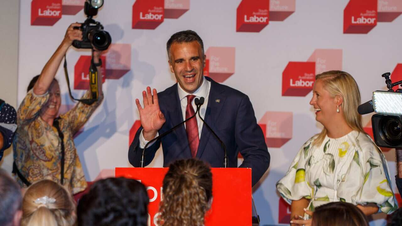 Peter Malinauskas and his wife Annabel SA Labor Leader celebrates victory for Labor during the 2022 State Election at Adelaide Oval in Adelaide, Saturday, March 19, 2022. (AAP Image/Matt Turner) NO ARCHIVING