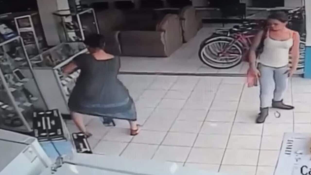 Surveillance video shows woman stealing TV under skirt