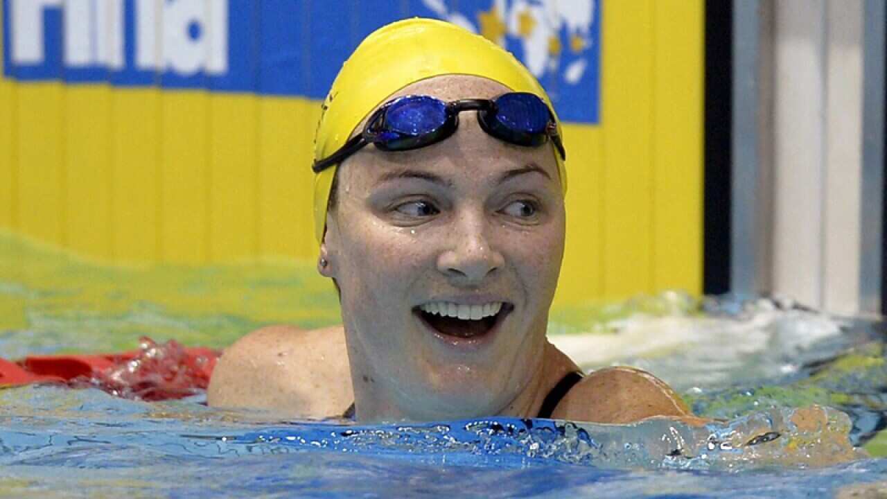 Cate Campbell of Australia smiles after winning the 50m freestyle.