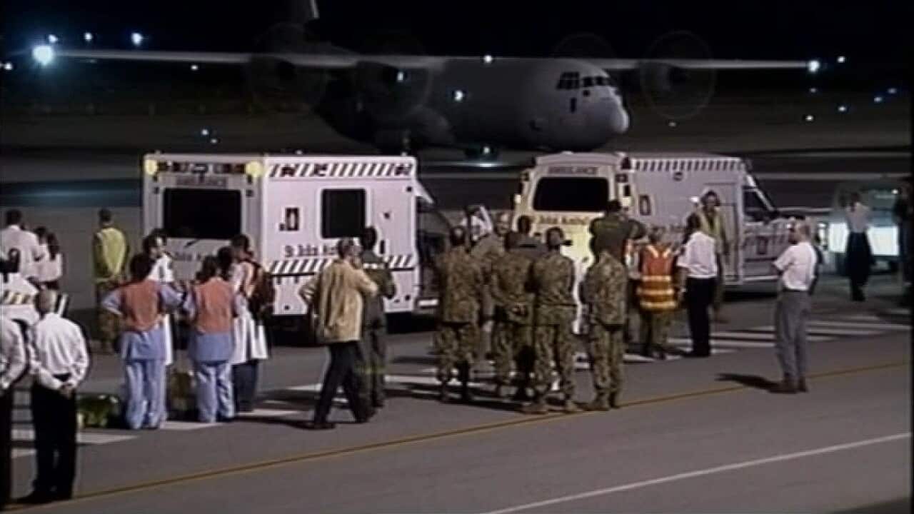 Bali bombing victims arrive in Darwin to be taken to hospital in 2002 (SBS).jpg