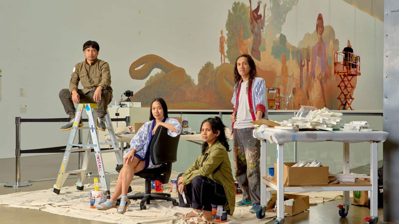 Philippine-based Kikik Kollektive during the installation of their mural Tul-an sang aton kamal-aman (Bones of our elders) for the 11th Asia Pacific Triennial of Contemporary Art at the Queensland Art Gallery | Gallery of Modern Art (QAGOMA)
