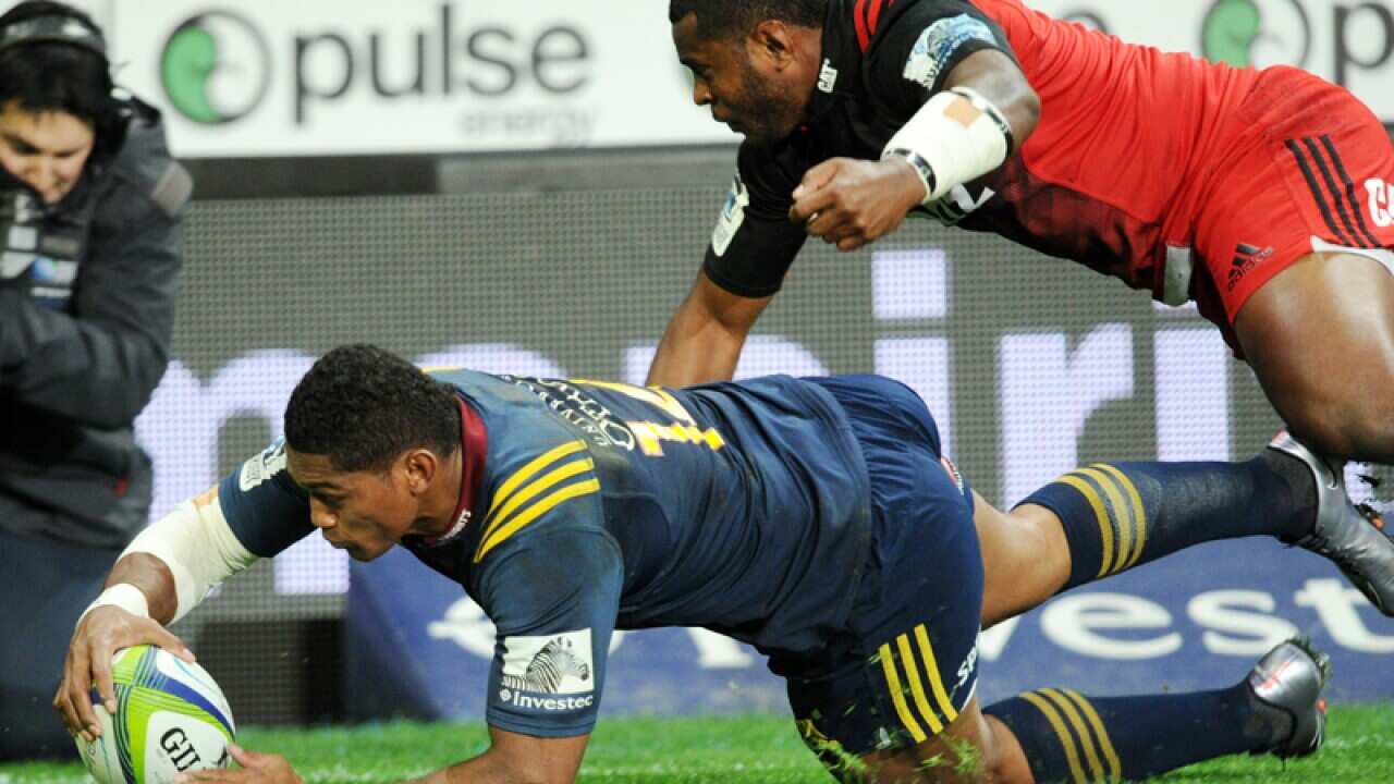 Waisake Naholo of the Highlanders scores
