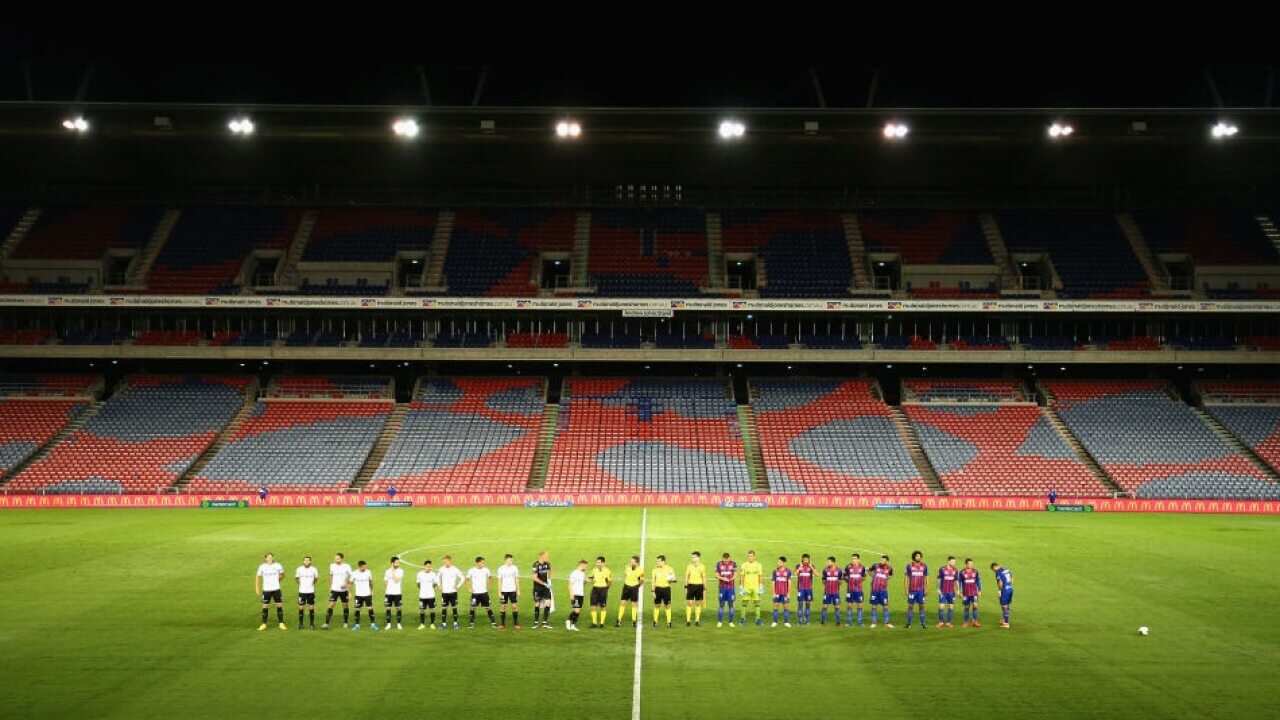 Melbourne City and Newcastle Jets face the empty stands before an A-League match