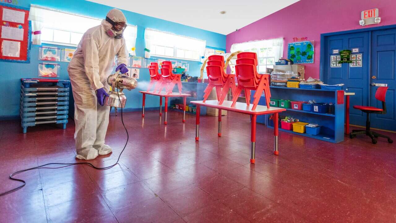 Preparing a classroom for returning to school classes.