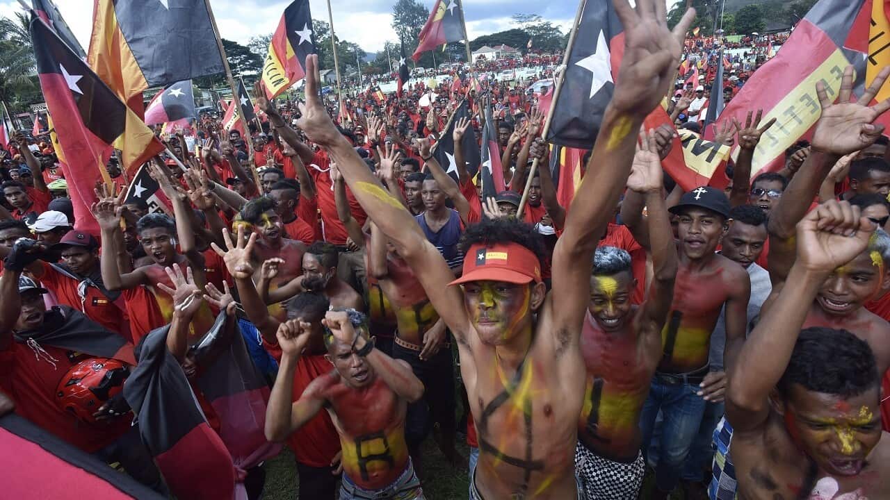 Fretilin party supporters rally in East Timor.