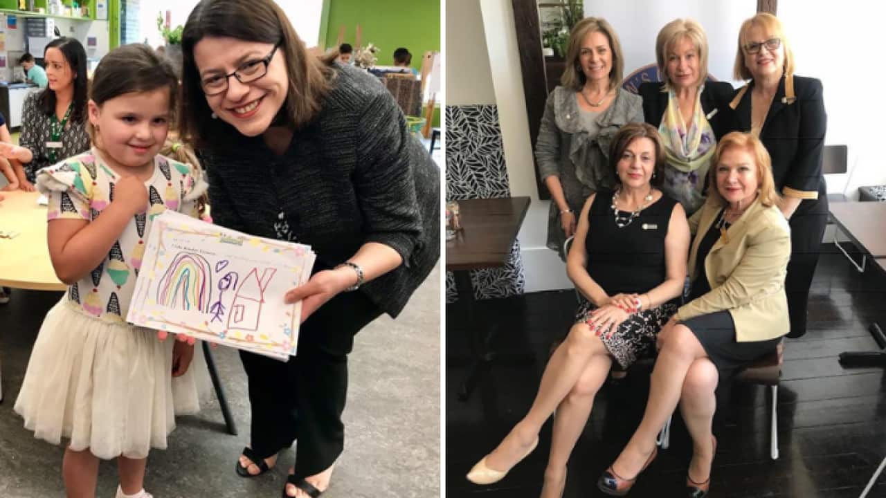 Victorian Minister Jenny Mikakos (left) and ESTIA's Committee members.