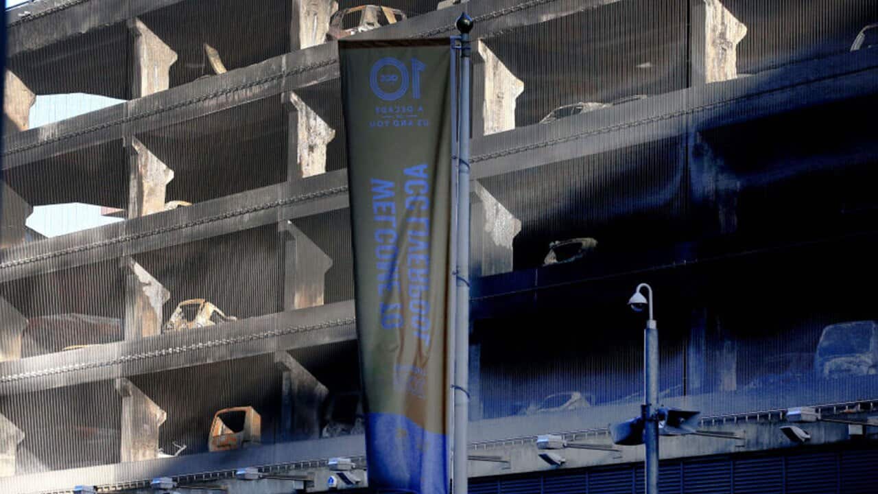 Burnt out cars seen at the multi storey car park near the Echo Arena in Liverpool.