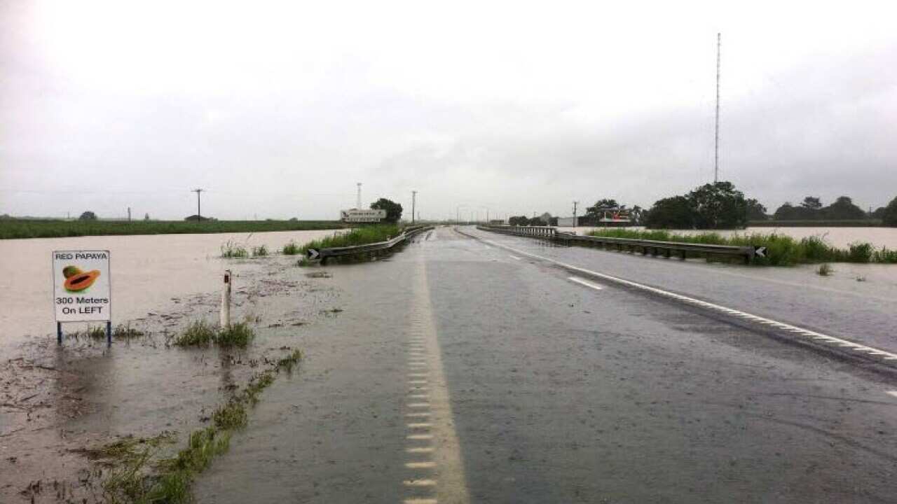 Murray and Tully Rivers flowing over roads near Euramo.