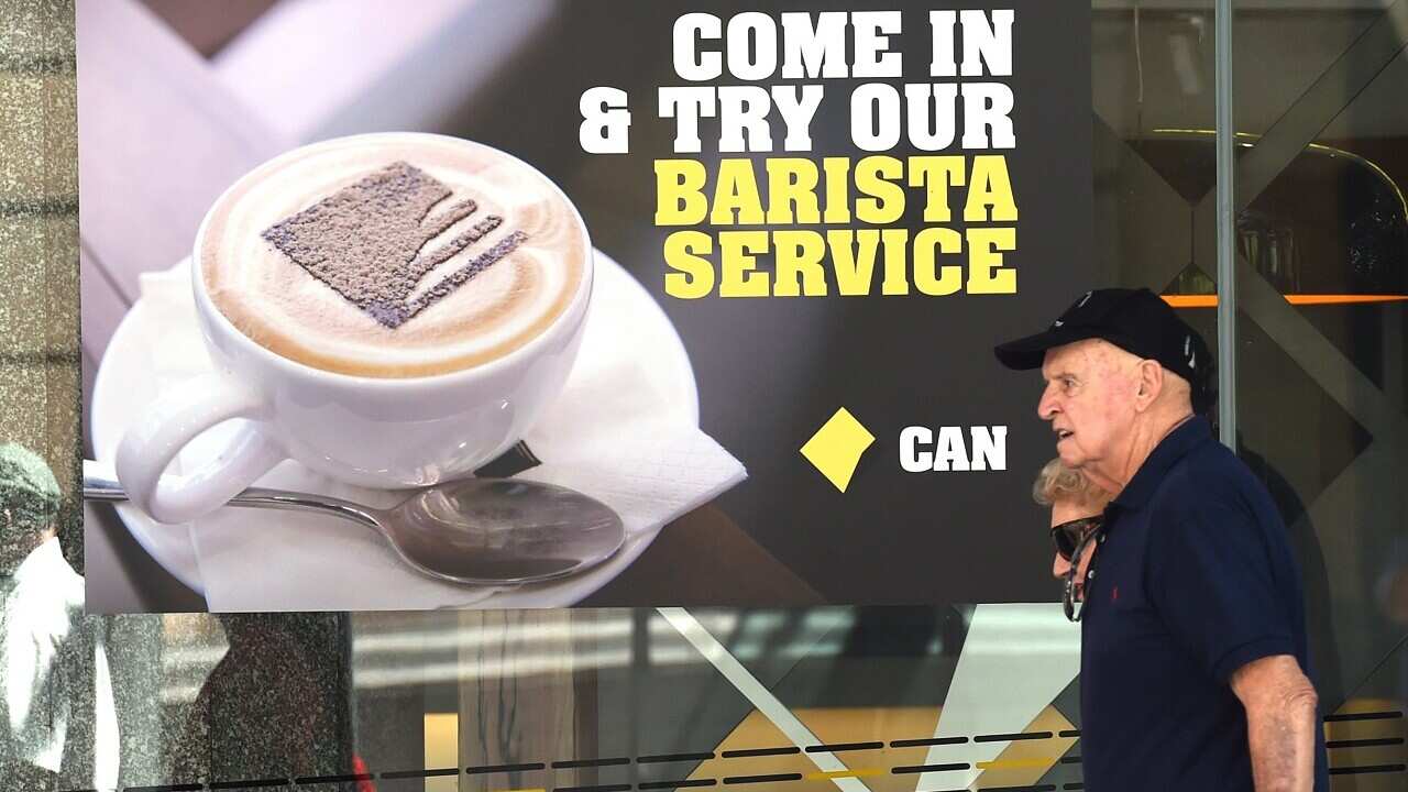 Commonwealth Bank advertising seen outside its main branch, Brisbane (AAP)