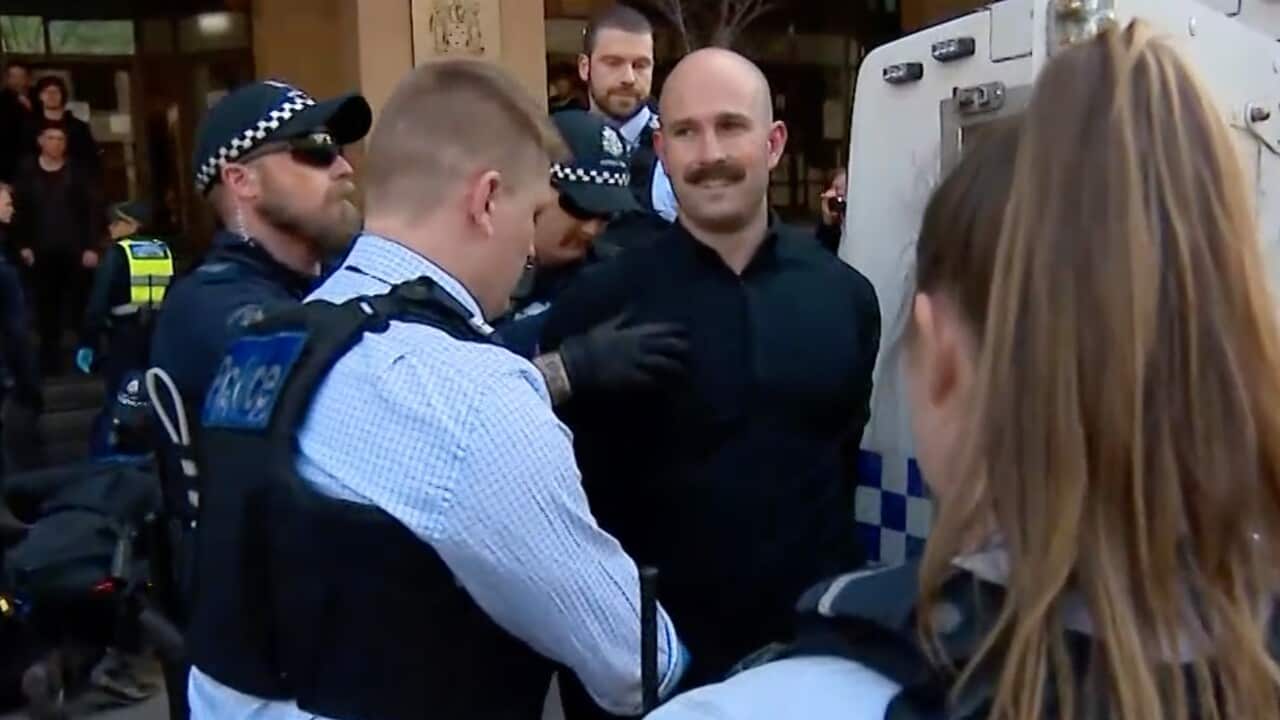 Neo Nazi Thomas Sewell being arrested outside the Melbourne Magistrates Court