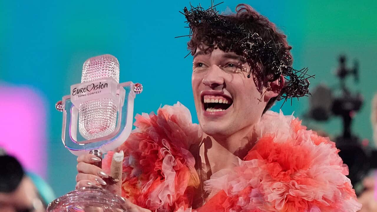 Nemo of Switzerland, holds their trophy and celebrates after winning the Grand Final of the Eurovision Song Contest 2024 in Sweden.