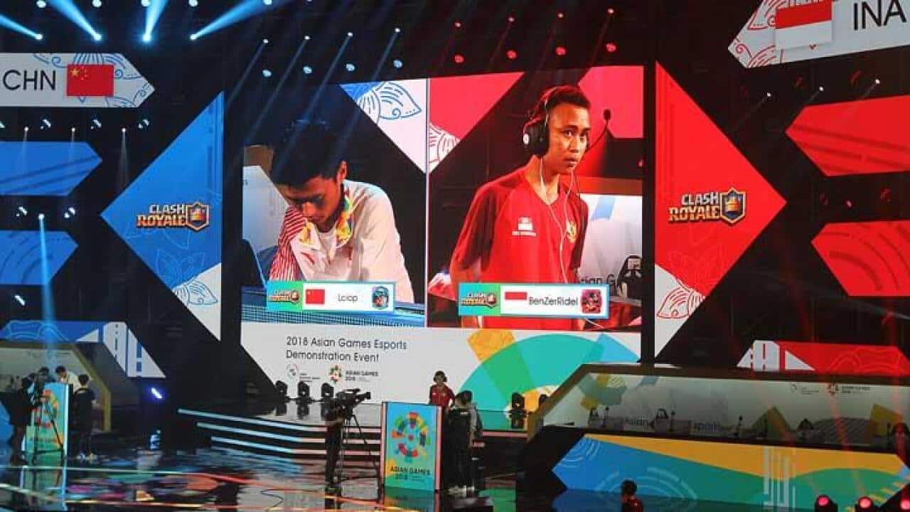 Indonesian player Sumarandak Ridel alias BenZerRidel, competes against China's Huang Chenghui alias Lciopdi, in the final of the Clash Royale eSports in the 2018 Asian Games.