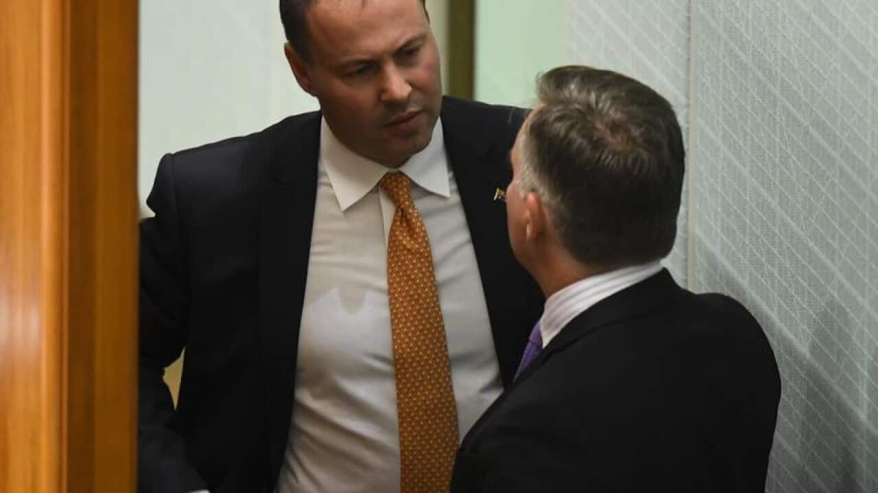 Josh Frydenberg and shadow treasurer Chris Bowen in parliament.