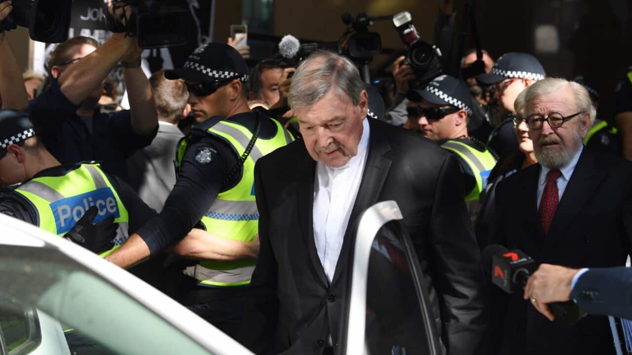 Cardinal George Pell departs the Melbourne Magistrates Court in Melbourne on Tuesday, May 1, 2018. 