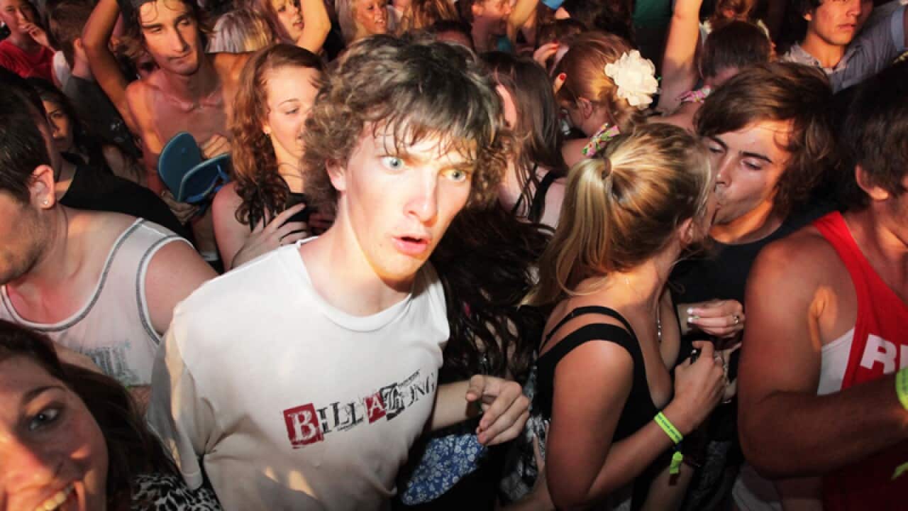 Young people party during the Schoolies festival on the Gold Coast