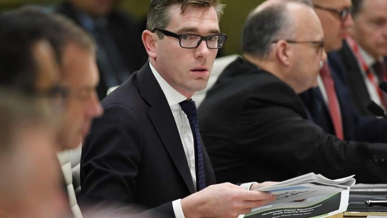 NSW Treasurer Dominic Perrottet is seen during a meeting.