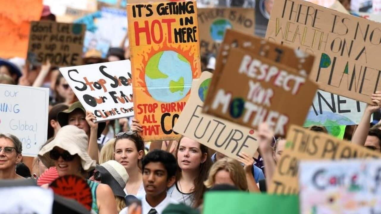 School students take part in a climate change strike in Brisbane.