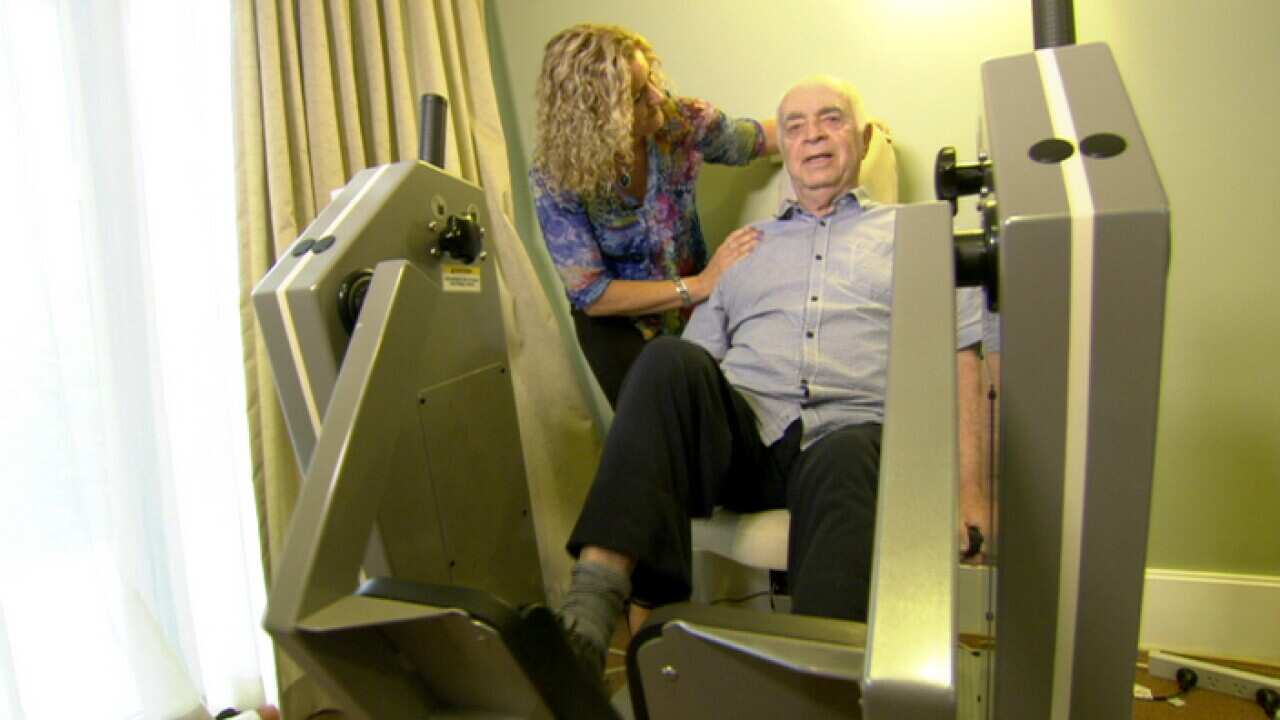A resident of Montefiore Jewish Home in eastern Sydney using one of its rehabilitation machines