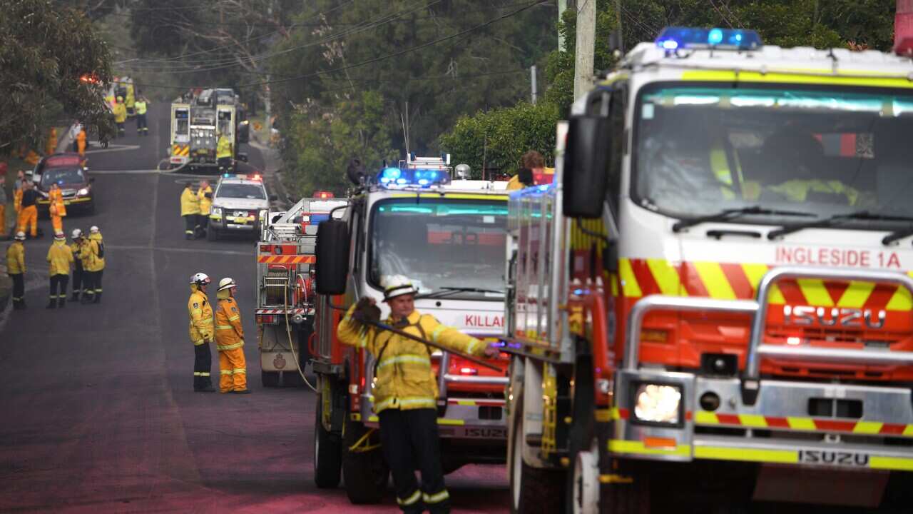 Fire crews protect properties in South Turramurra in Sydney's northern suburbs